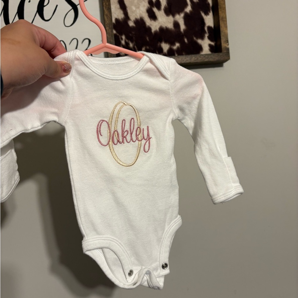 White Baby Onesie with Pink and Gold Embroidery